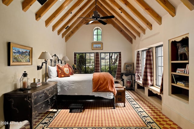 bedroom featuring beam ceiling and high vaulted ceiling