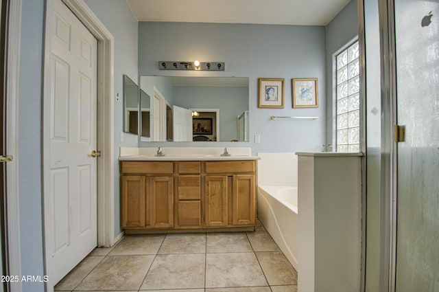 bathroom with tile patterned flooring, vanity, and independent shower and bath