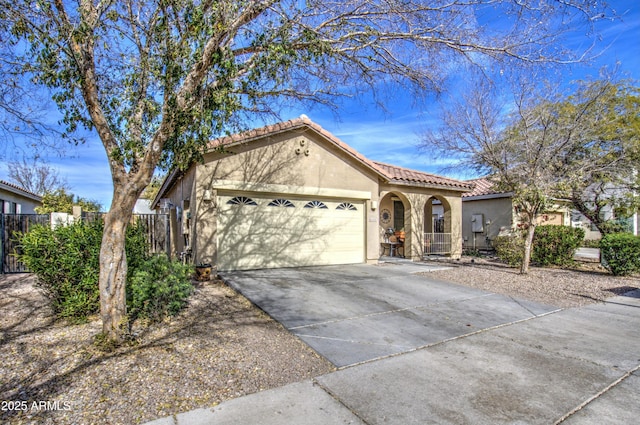 view of front of home with a garage