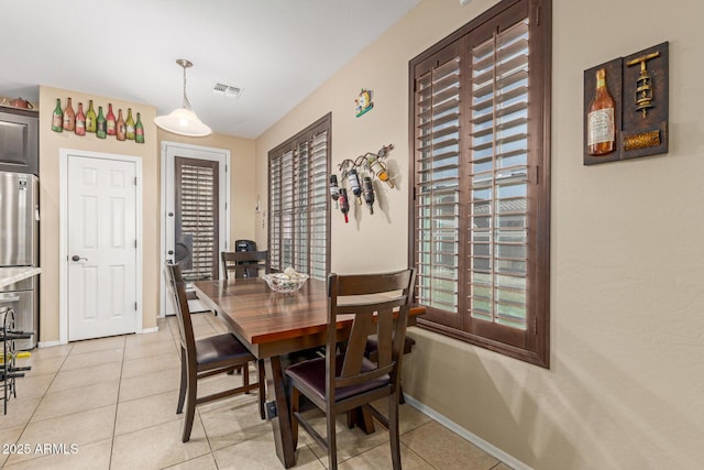 16259 W Papago St, Goodyear, AZ 85338 - dining space with light tile patterned floors and baseboards