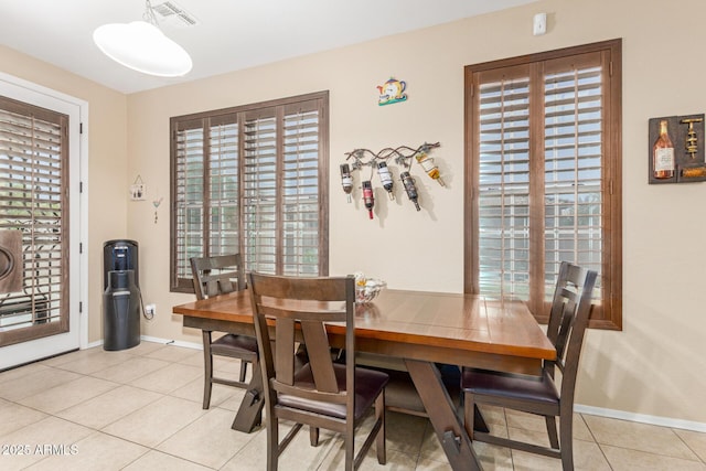 16259 W Papago St, Goodyear, AZ 85338 - dining space featuring light tile patterned floors and baseboards