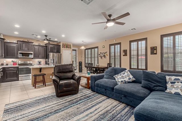 16259 W Papago St, Goodyear, AZ 85338 - living area with ceiling fan, recessed lighting, and light tile patterned floors