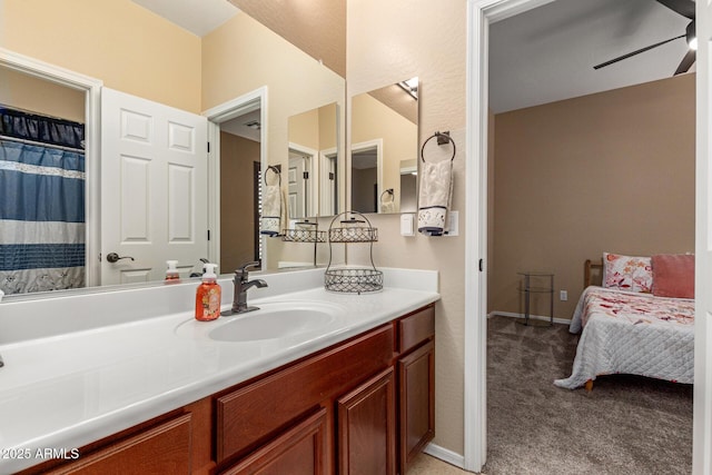 16259 W Papago St, Goodyear, AZ 85338 - bathroom with vanity, a ceiling fan, and ensuite bathroom