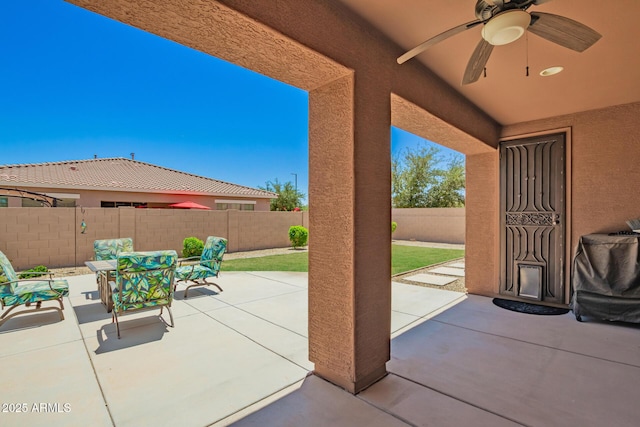 16259 W Papago St, Goodyear, AZ 85338 - fenced backyard featuring ceiling fan and a patio area