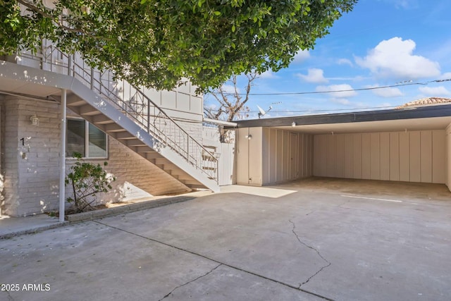 view of patio / terrace with a carport