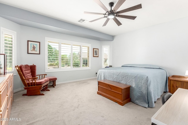 bedroom featuring multiple windows, carpet, baseboards, and a ceiling fan