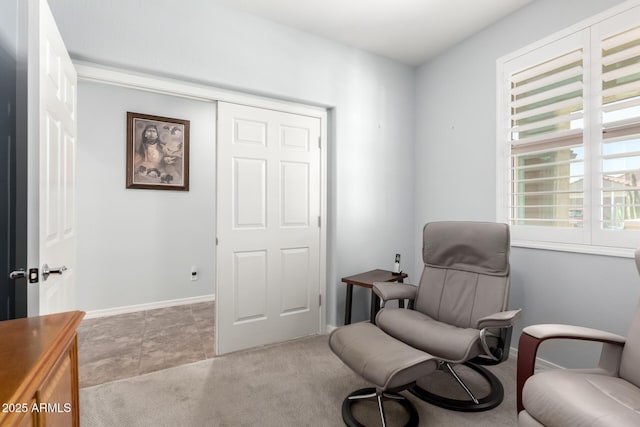 living area with baseboards