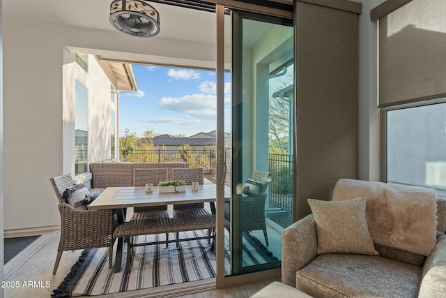 balcony featuring outdoor dining space