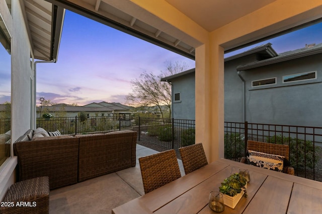 view of patio / terrace with an outdoor living space and outdoor dining area