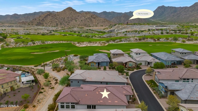 birds eye view of property featuring a mountain view and golf course view