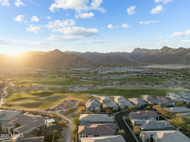 property view of mountains with golf course view and a residential view