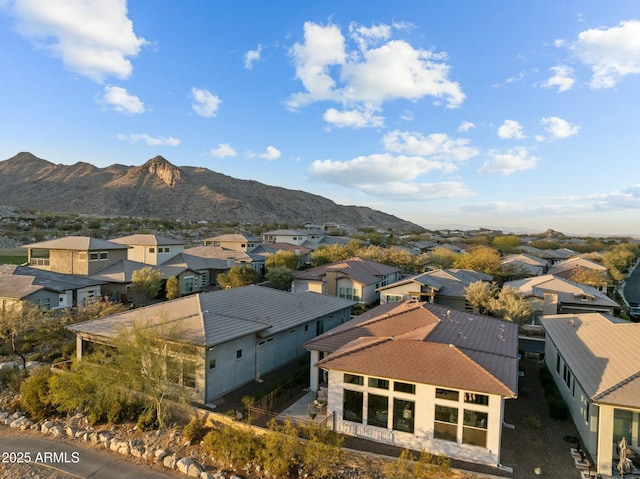 aerial view featuring a mountain view and a residential view