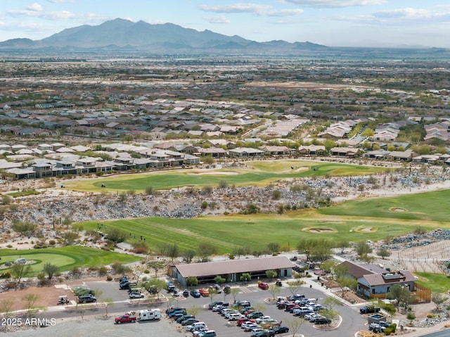 bird's eye view with a mountain view, golf course view, and a residential view