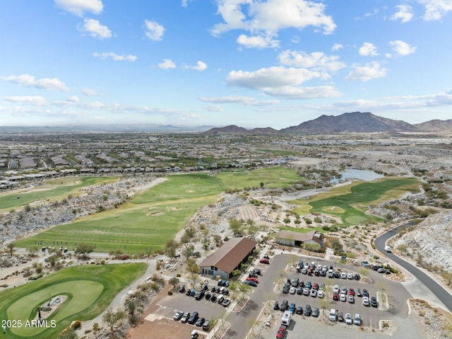 bird's eye view with a mountain view and golf course view