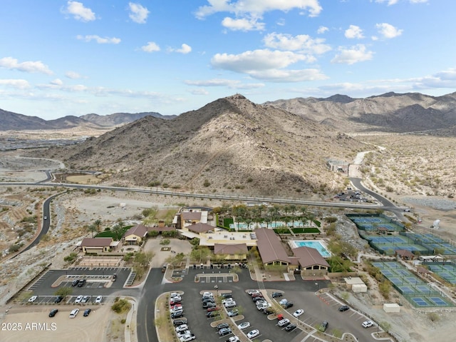 birds eye view of property with a mountain view