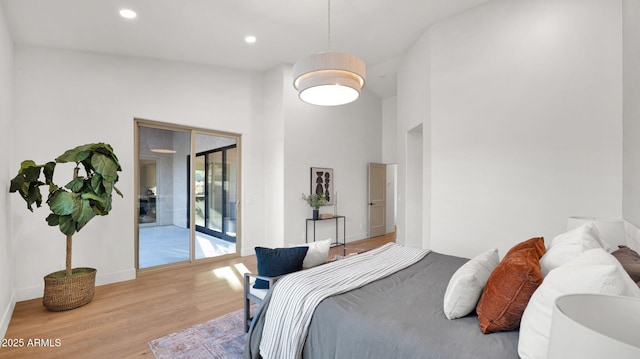5103 E Juniper Ave, Scottsdale, AZ 85254 - bedroom with access to outside, light wood finished floors, baseboards, recessed lighting, and a towering ceiling