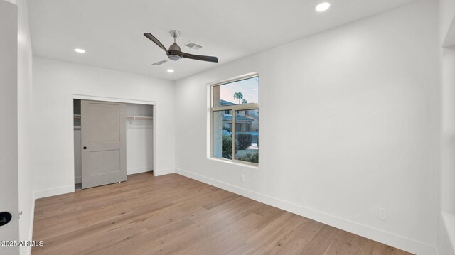 5103 E Juniper Ave, Scottsdale, AZ 85254 - unfurnished bedroom featuring wood finished floors, recessed lighting, baseboards, a closet, and a ceiling fan