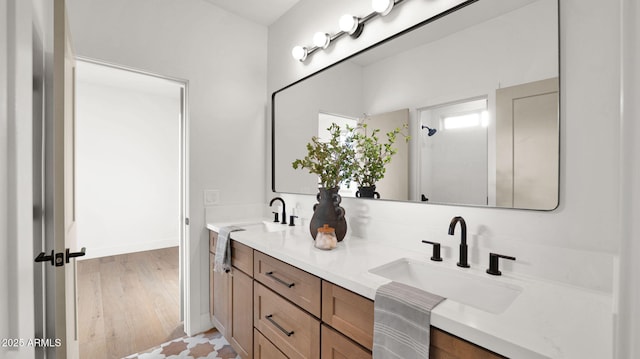 5103 E Juniper Ave, Scottsdale, AZ 85254 - bathroom with double vanity and wood finished floors