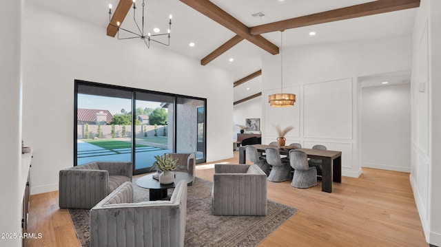 5103 E Juniper Ave, Scottsdale, AZ 85254 - living area featuring a chandelier, beam ceiling, recessed lighting, light wood-style floors, and baseboards