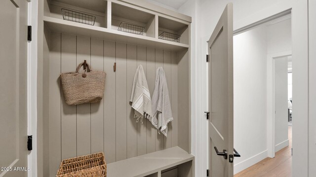 5103 E Juniper Ave, Scottsdale, AZ 85254 - mudroom featuring light wood-style floors and baseboards