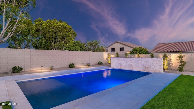 5103 E Juniper Ave, Scottsdale, AZ 85254 - pool at dusk featuring a fenced backyard