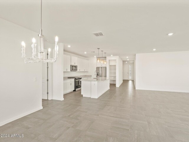 living room with beamed ceiling, a chandelier, high vaulted ceiling, and a healthy amount of sunlight