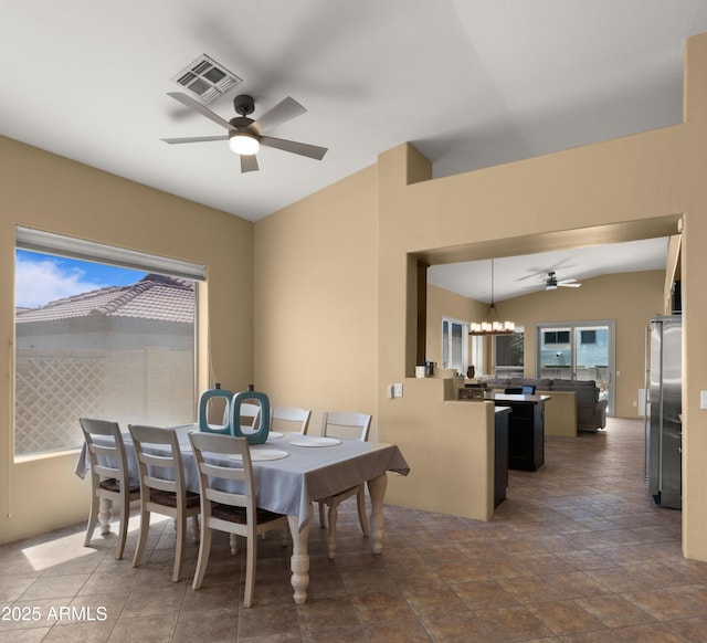 13614 N 12th Way, Phoenix, AZ 85022 - dining space featuring visible vents, vaulted ceiling, and ceiling fan with notable chandelier