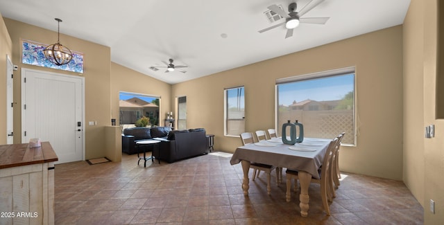 13614 N 12th Way, Phoenix, AZ 85022 - dining room featuring ceiling fan with notable chandelier, stone finish floor, and lofted ceiling