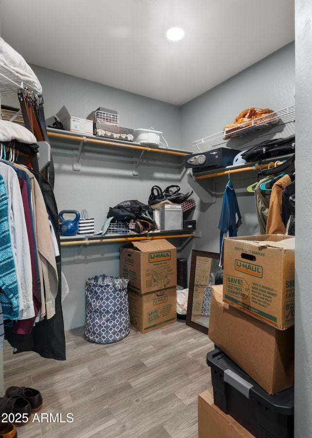 13614 N 12th Way, Phoenix, AZ 85022 - walk in closet featuring wood finished floors