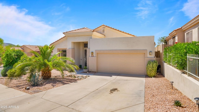 13614 N 12th Way, Phoenix, AZ 85022 - view of front of property with driveway, fence, a tiled roof, an attached garage, and stucco siding