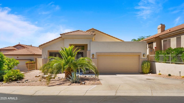 13614 N 12th Way, Phoenix, AZ 85022 - view of front of house featuring stucco siding, a tiled roof, fence, a garage, and concrete driveway