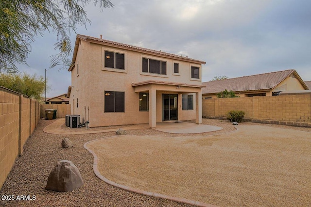 back of house featuring a patio area