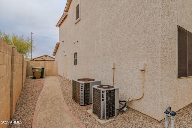 view of property exterior with central air condition unit