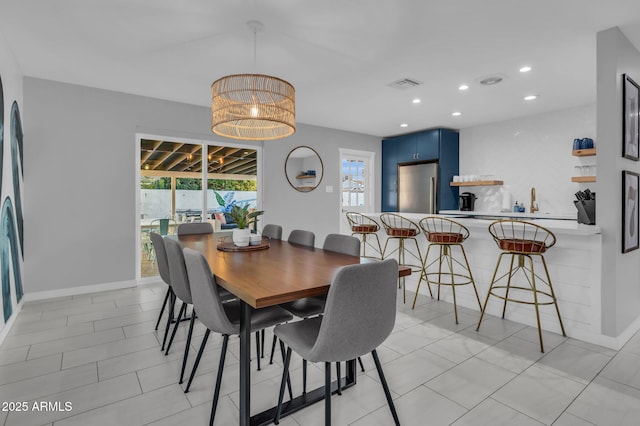 8243 E Montecito Ave, Scottsdale, AZ 85251 - dining area featuring visible vents, baseboards, recessed lighting, and a chandelier