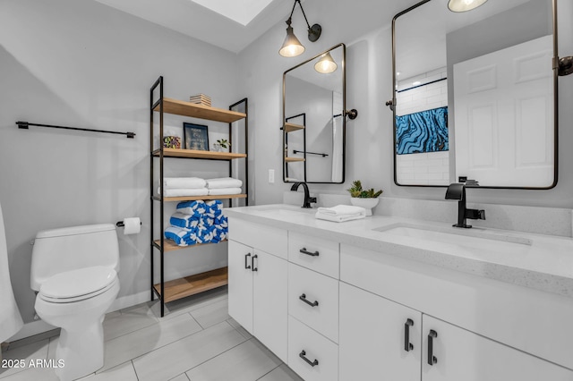 8243 E Montecito Ave, Scottsdale, AZ 85251 - bathroom featuring a sink, tile patterned floors, toilet, and double vanity