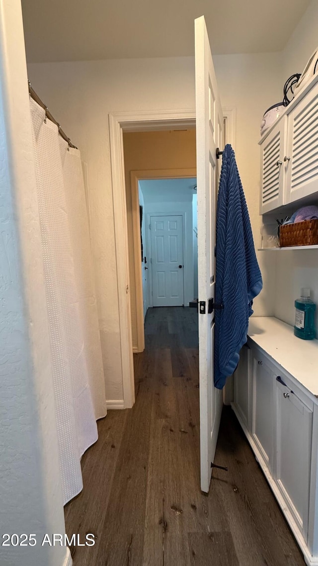 bathroom featuring wood finished floors