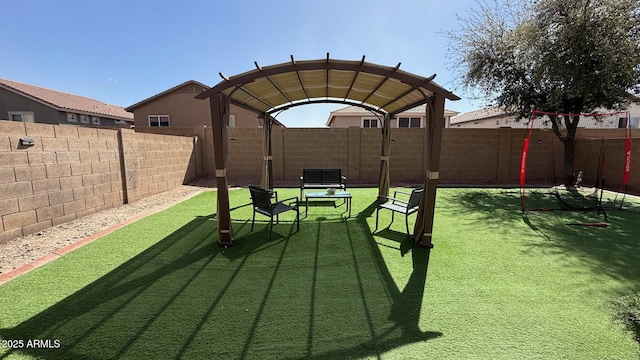 view of yard with a fenced backyard