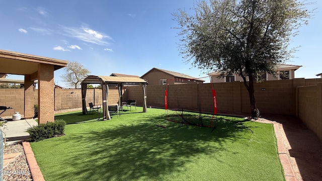 view of yard with a fenced backyard