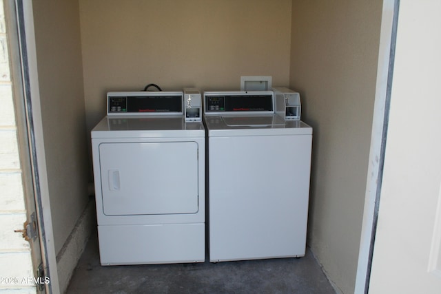 8124 N 33rd Dr, Phoenix, AZ 85051 - community laundry room featuring washer and dryer and plenty of natural light