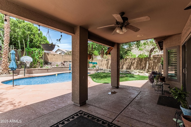 6422 W Range Mule Dr, Phoenix, AZ 85083 - view of patio with a ceiling fan and a fenced backyard