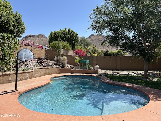 6422 W Range Mule Dr, Phoenix, AZ 85083 - view of swimming pool with a mountain view and a fenced backyard