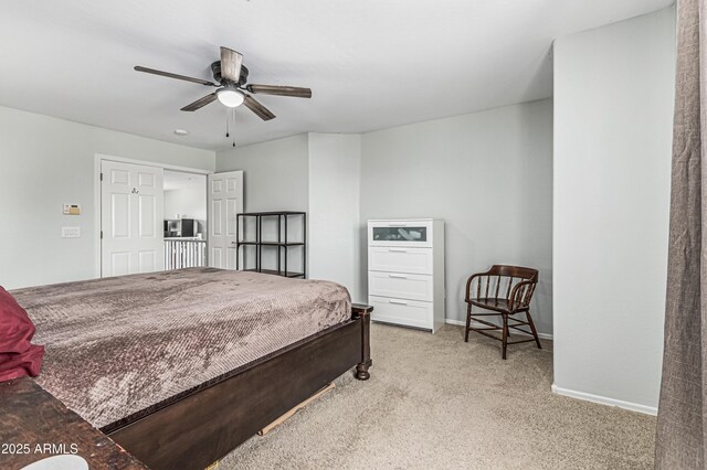 6422 W Range Mule Dr, Phoenix, AZ 85083 - carpeted bedroom with baseboards and a ceiling fan