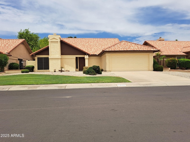 7420 W Morrow Dr, Glendale, AZ 85308 - view of front of home with stucco siding, a garage, driveway, a chimney, and a tile roof