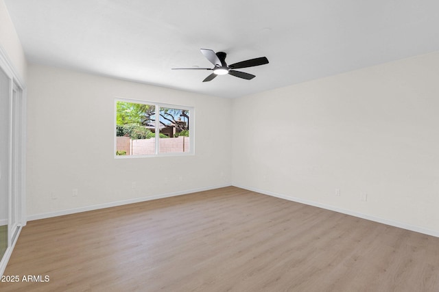 unfurnished bedroom with light wood finished floors, baseboards, a closet, and a ceiling fan