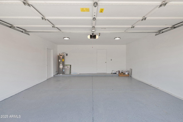 garage featuring a garage door opener and water heater