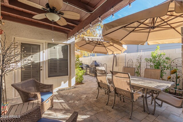 view of patio / terrace with grilling area and ceiling fan