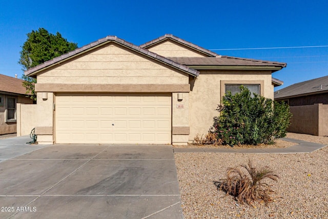 ranch-style home with a garage