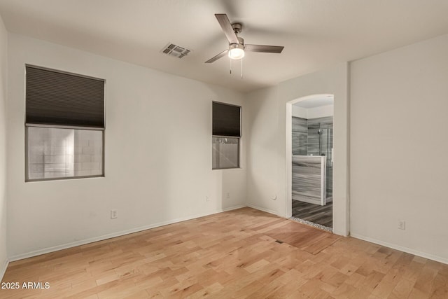 unfurnished room featuring light hardwood / wood-style flooring and ceiling fan