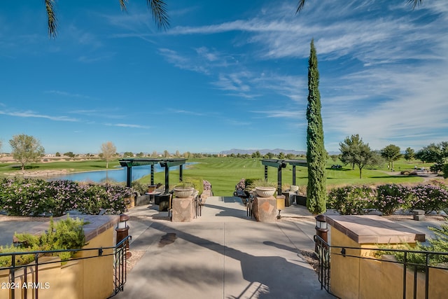 view of patio featuring a water view