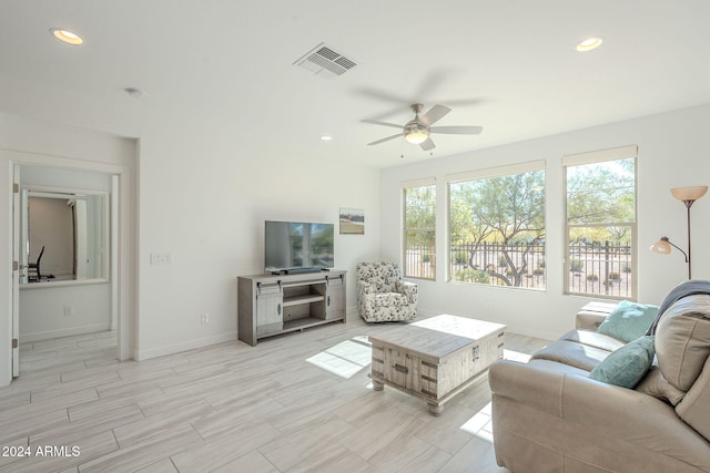 living room with ceiling fan